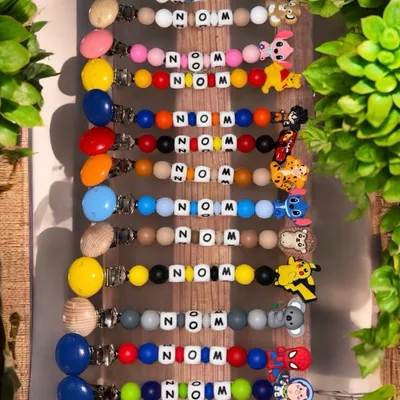 Attache tétine anneau de dentition porte clé stylo personnalisée etc Disney vintage rare 